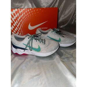 White Nike Renew Run Sneakers